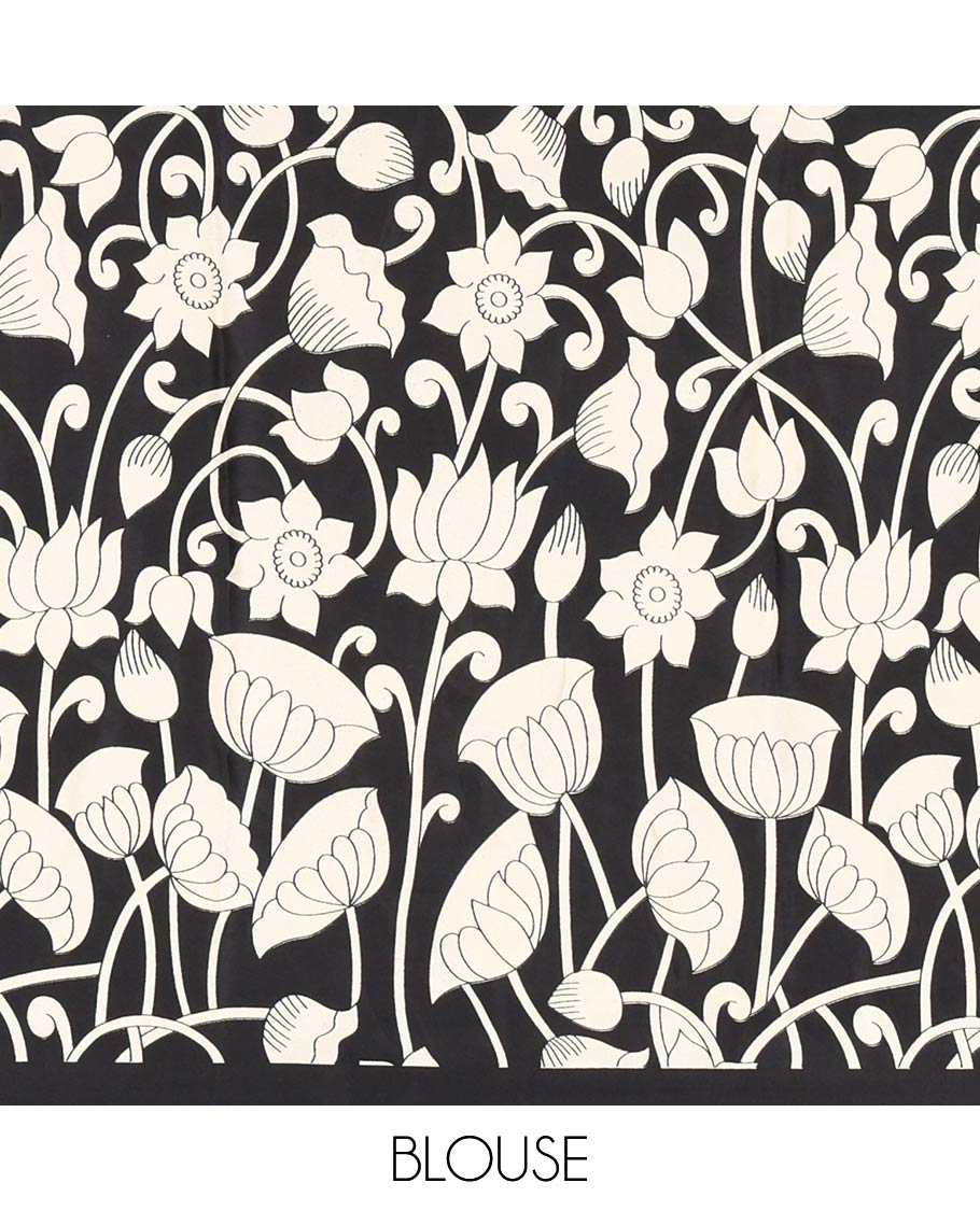 Chikku-black half-and-half plain and kalamkari floral printed satin crepe saree, plain border, pallu of floral vine and peacock printed, and kalamkari floral printed blouse