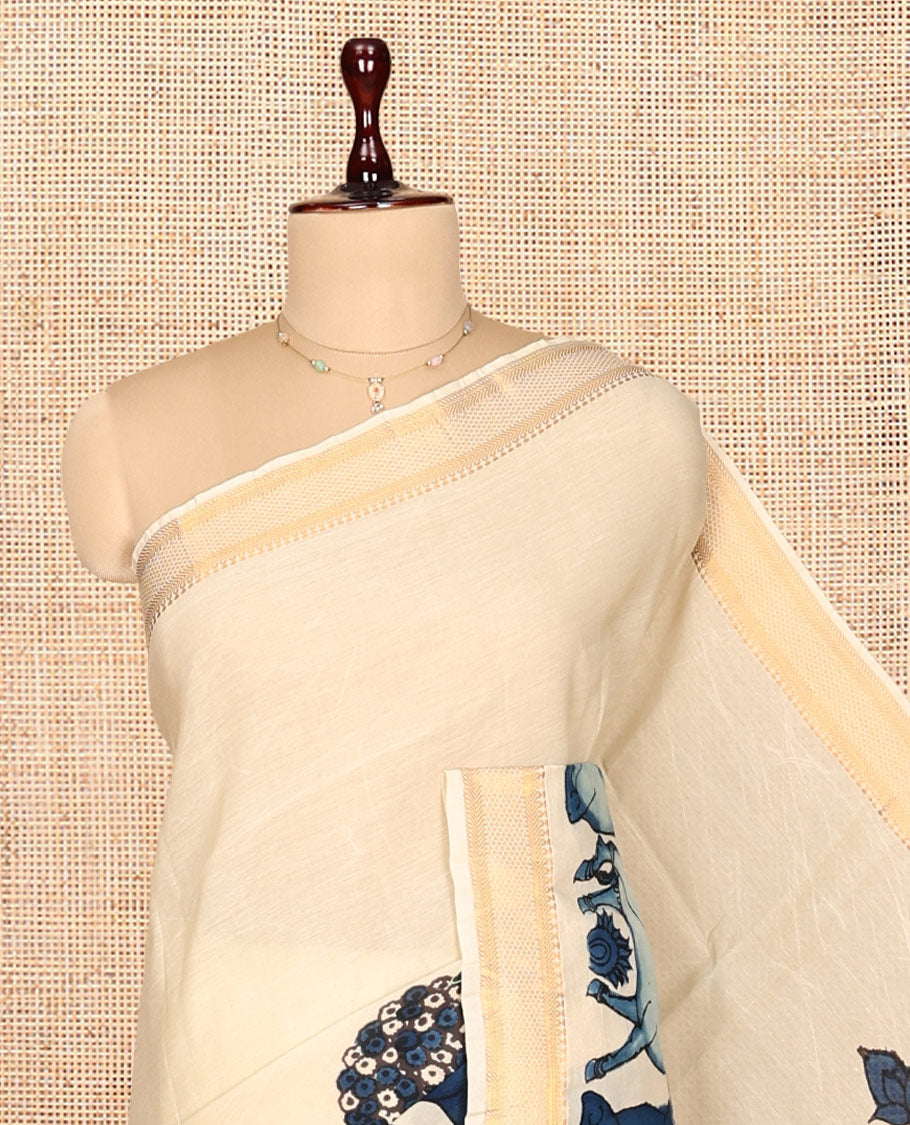 Cream Kalamkari Silk Saree, Crafted with Flora-Fauna Motifs, a Traditional Zari Border, Peacock Kalamkari Pallu, and a Matching Blouse