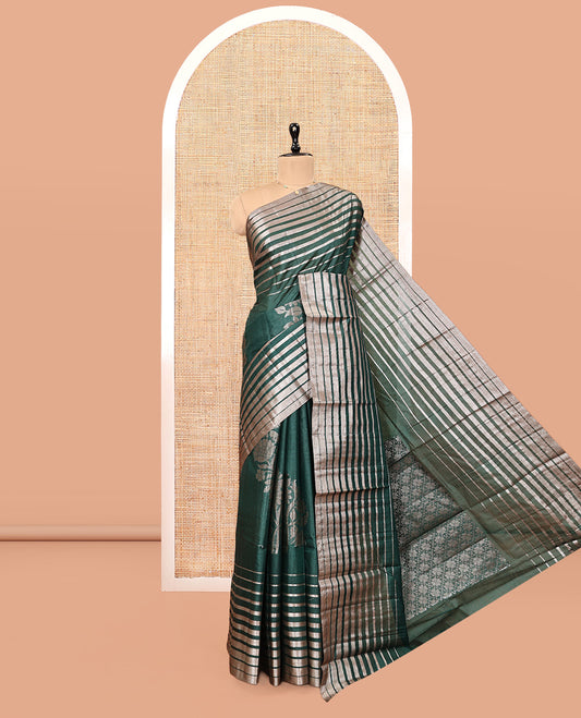 Borderless Green Tussar Silk Saree, Impeccably Styled with Zari Stripes and Floral Buttas, Striped Pallu, and a Matching Blouse