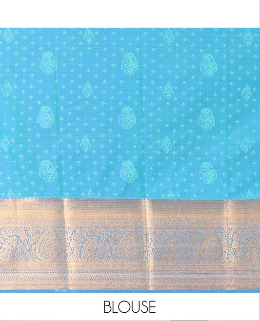 Blue Art Silk Material Half Saree Set, Adorned with Zari Buttas on Its Skirt, a Contrast Traditional Zari Design Border, Paired with a Matching Blouse, and a Dhavani Decorated with Zari Designs