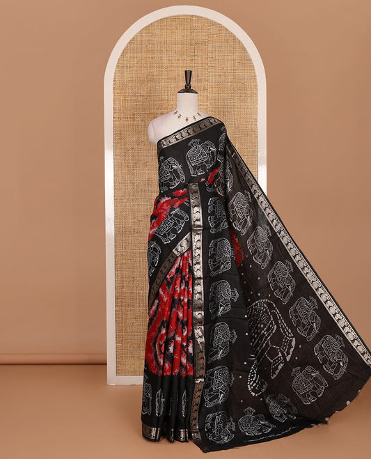 Black-maroon shibori printed muslin cotton saree, contrast batik elephant print border of zari annam, batik elephant pallu, and contrast polka dots print blouse