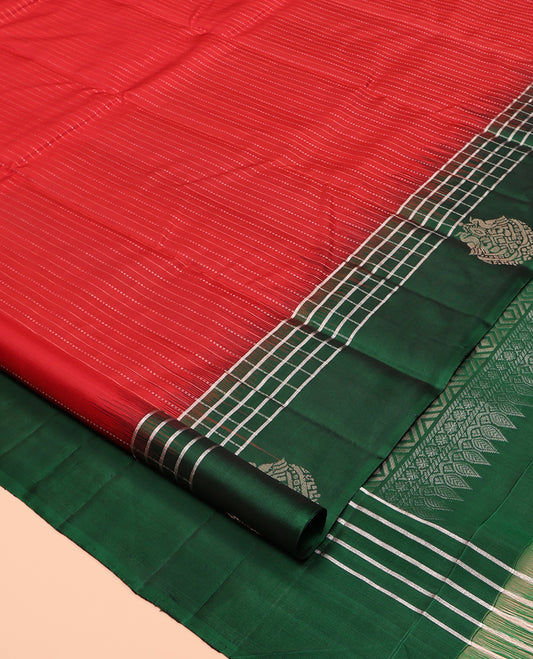 Red Kanchipuram Silk Saree, Subtly Sparkled with Stripes, a Contrast Checked Border of Peacock Buttas, Grand Jaal Pallu, and a Contrast Blouse