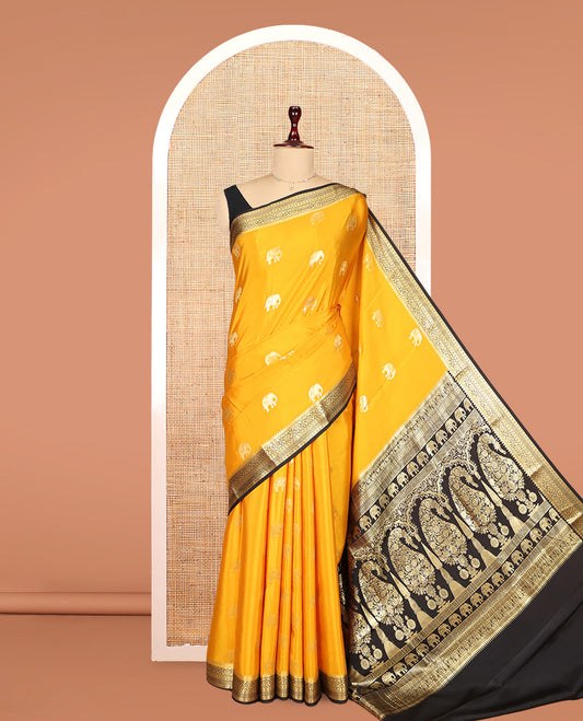 Yellow Mysore Silk Saree, Adorned with Elephant Buttas, Complemented by a Contrast Traditional Zari Border, Grand Pallu, and a Contrast Blouse