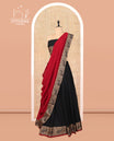 Black Cotton Half-Saree Features Plain Skirt, a Contrast Peacock Border, a Matching Blouse, and a Contrast Peacock Dhavani