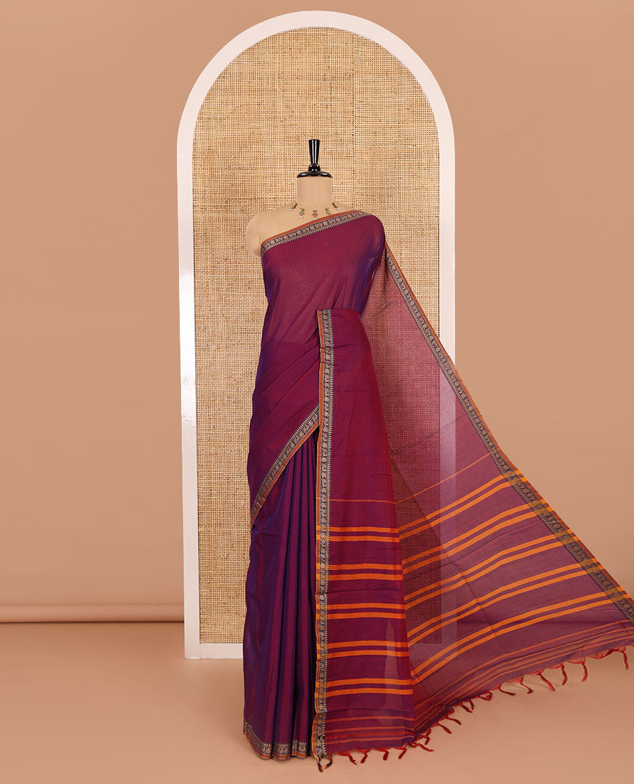 Purple plain mercerised cotton saree, contrast temple traditional border, striped pallu, and a matching blouse