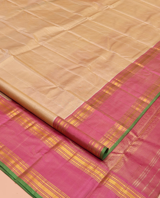 Sandal Plain Kanchipuram Silk Saree, Complemented by Contrast Rettai Pettu Border of Rekku, Rudraksham, and Vanki Designs, Pallu of Traditional Zari Designs, and Paired with a Contrast Blouse