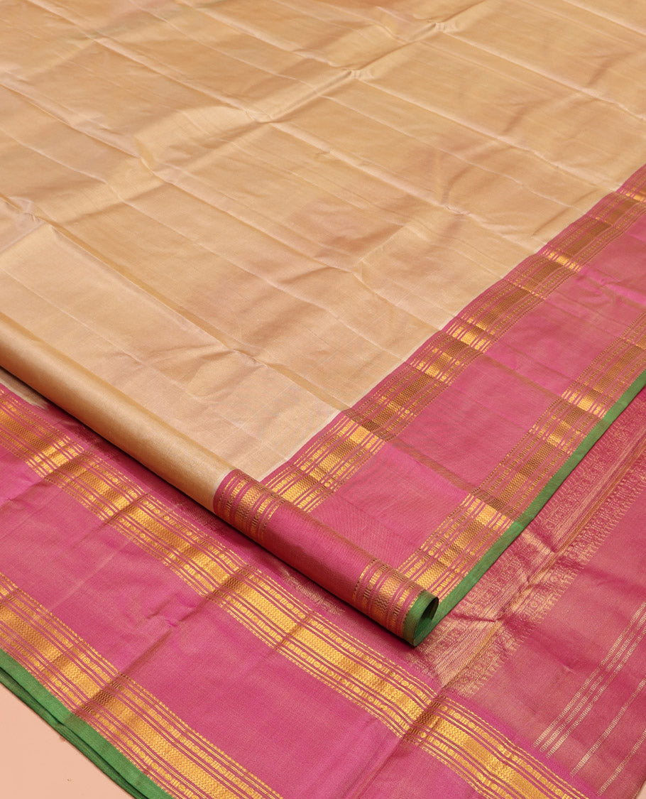 Sandal Plain Kanchipuram Silk Saree, Complemented by Contrast Rettai Pettu Border of Rekku, Rudraksham, and Vanki Designs, Pallu of Traditional Zari Designs, and Paired with a Contrast Blouse