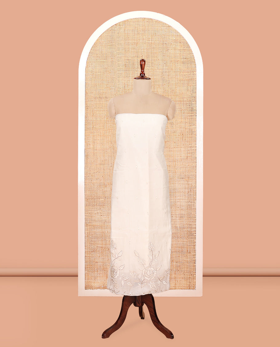 Cream Mul Chanderi Material Churidar Features a Floral Outline Embroidered Top, a Santoon Bottom, a Scallop Threadwork Dupatta