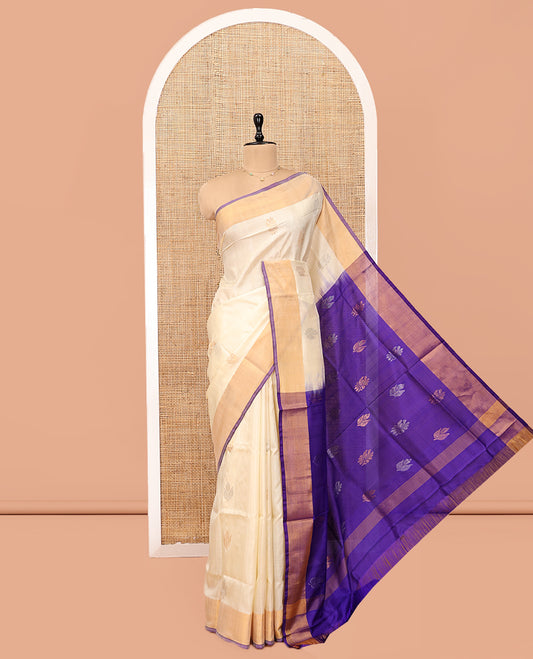 Sandal Uppada Silk Saree, Subtly Sparkled with Zari Buttas, Complemented by a Plain Border, Zari Buttas Woven Pallu, and a Contrast Blouse