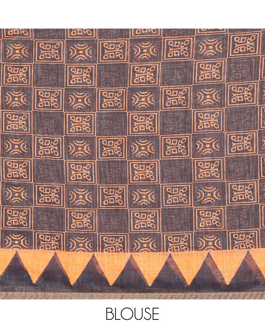 Orange vertical stripes printed linen cotton saree, a temple-printed border, big polka dot printed pallu, and a printed blouse