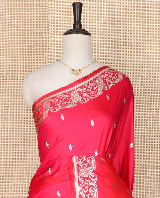 Red buttas banarasi silk saree, floral-paisley design border, and pallu of intricate designs