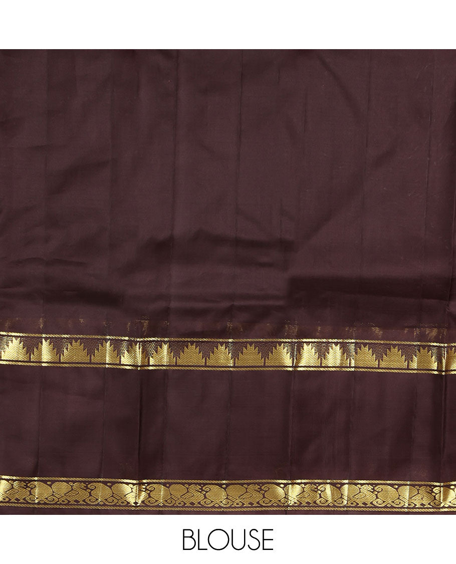 Dark Rust Plain Kanchipuram Silk Saree, a Contrast Rettai Pettu Border of Thazampoo Rekku, Mayil, and Maga Designs, Zari Striped Pallu, and a Contrast Blouse
