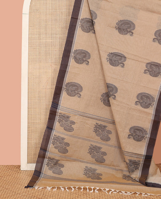 Sandal Kanchi Cotton Saree, Beautified with Peacock Buttas All Over Its Body, Complemented by Contrast Border, Pallu Steeped with Flower Vase Designs, and Paired with a Matching Blouse