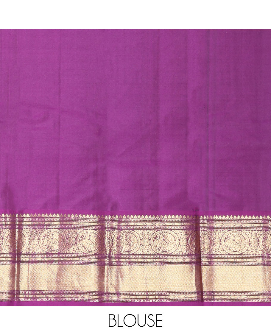 Rexona Green Vasundhara Silk Saree, Beautified with Sparse Stripes and Zari Buttas, Complemented by a Contrast Border of Thilakam, Banaras, Muthu, and Round Mayil Designs, Pallu Steeped with Traditional Designs, and Paired with a Contrast Blouse