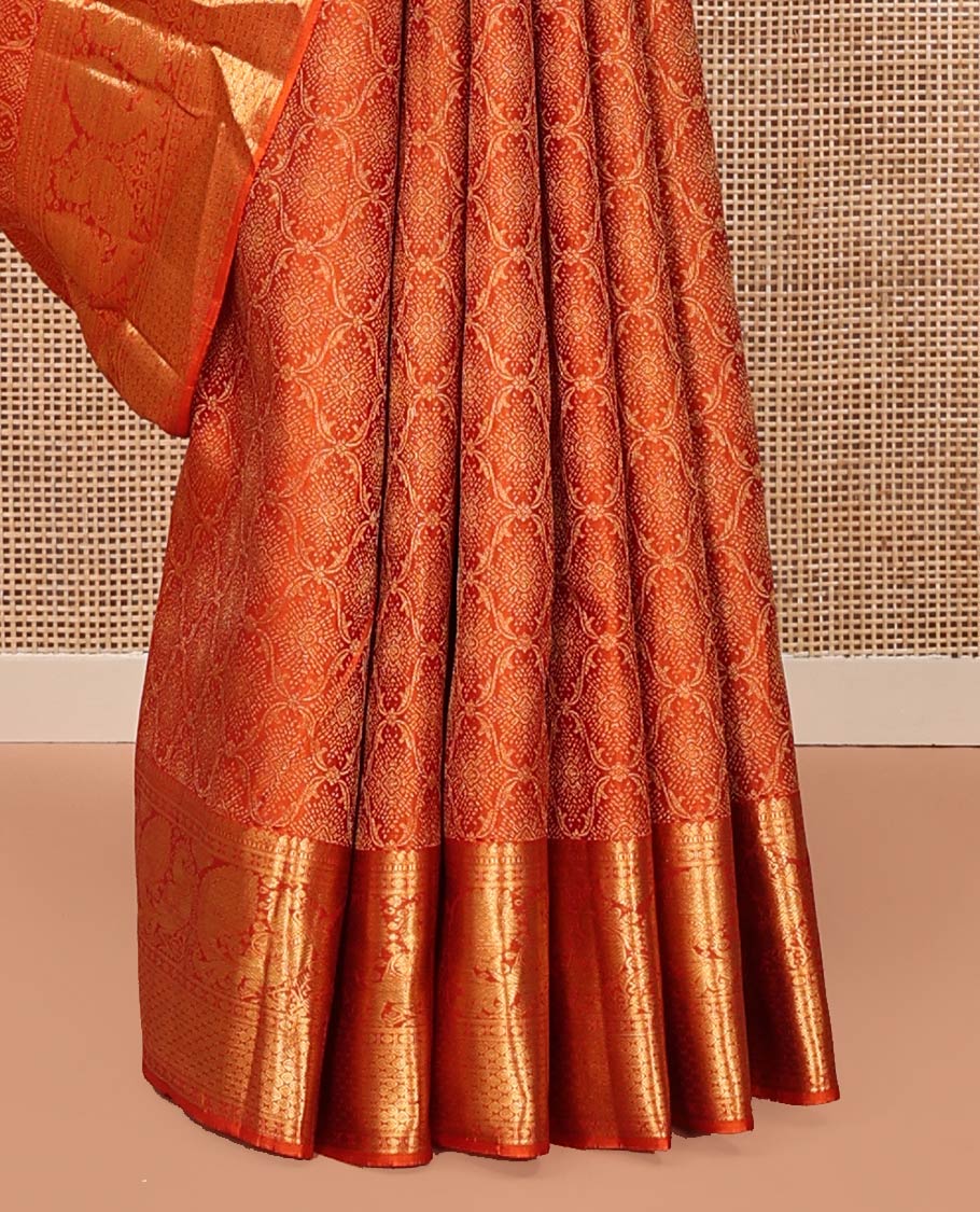 Rust Kanchipuram Wedding Silk Saree, Sparsely Woven with Jacquard Design On Its Body, Highlighted by Zari Border of Manga Mokku and Mayil Designs, Grand Jaal Pallu and Paired with a Matching Blouse