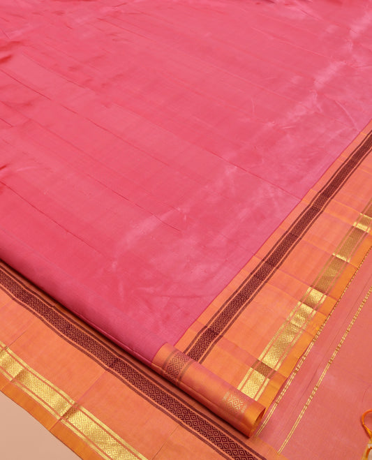 Pink Plain Kanchipuram Silk Saree, Complemented by a Contrast One-Sided Rettai Pettu Mayil Kann Border, Zari Striped Pallu, and No Blouse