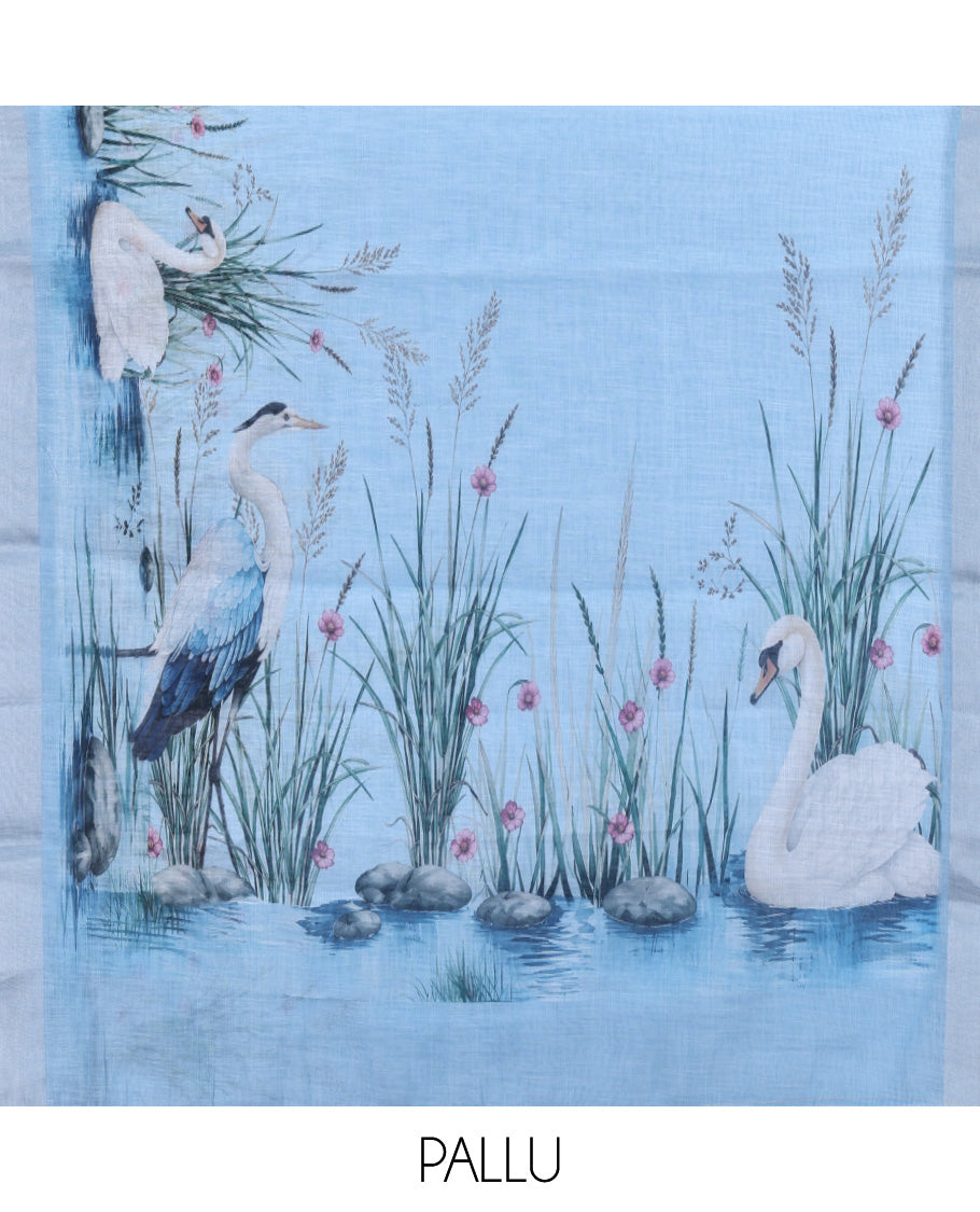 Blue Linen Cotton Saree, Accentuated with a Bird Print, a Subtle Zari Border, and a Matching Blouse