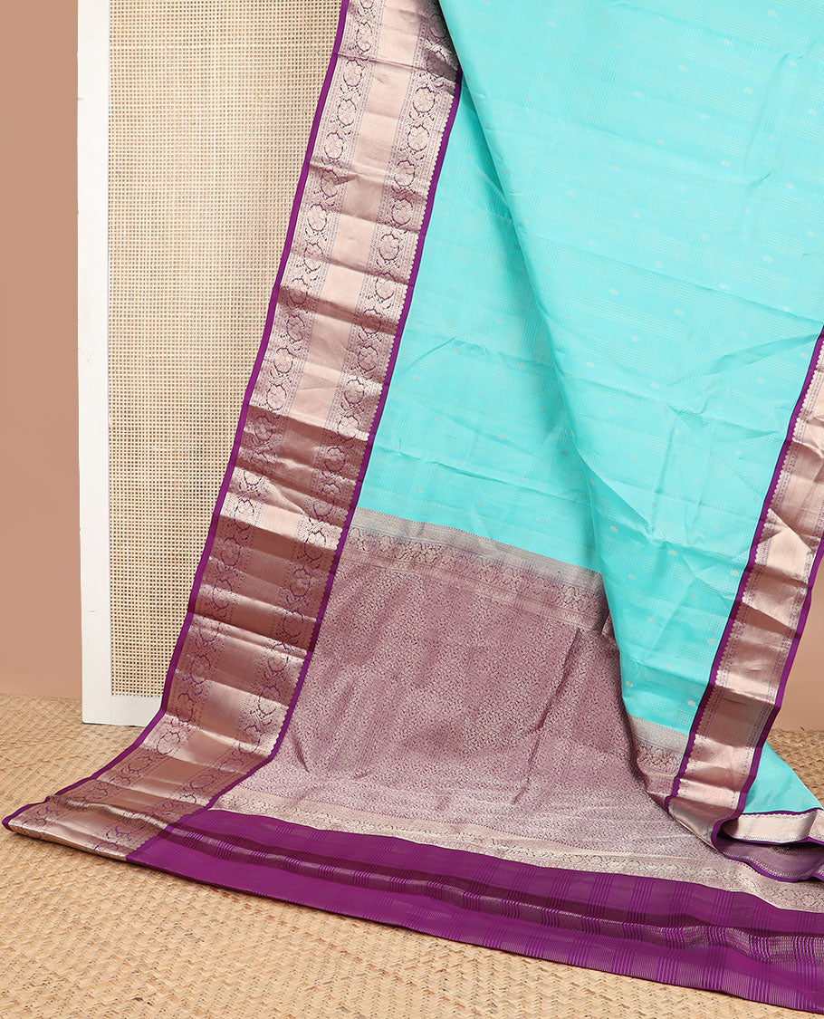 Light blue striped , buttas silk saree with contrast rettai pettu border of thilakam mokku, paun, muthu design & zari design pallu