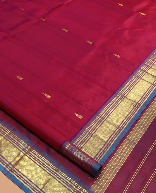 Maroon Kanchipuram Silk Saree, Elevated with Zari Buttas, a Contrast One-Sided Border of Paneer Sombu, Banaras, Muthu, and Mayil Kann Design, Zari Design Pallu, and No Blouse