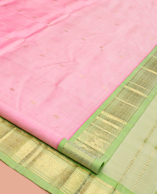 Pink Kanchipuram Silk Saree Features Zari Buttas, a Contrast One-Sided Zari Border, Zari-Woven Pallu, and No Blouse