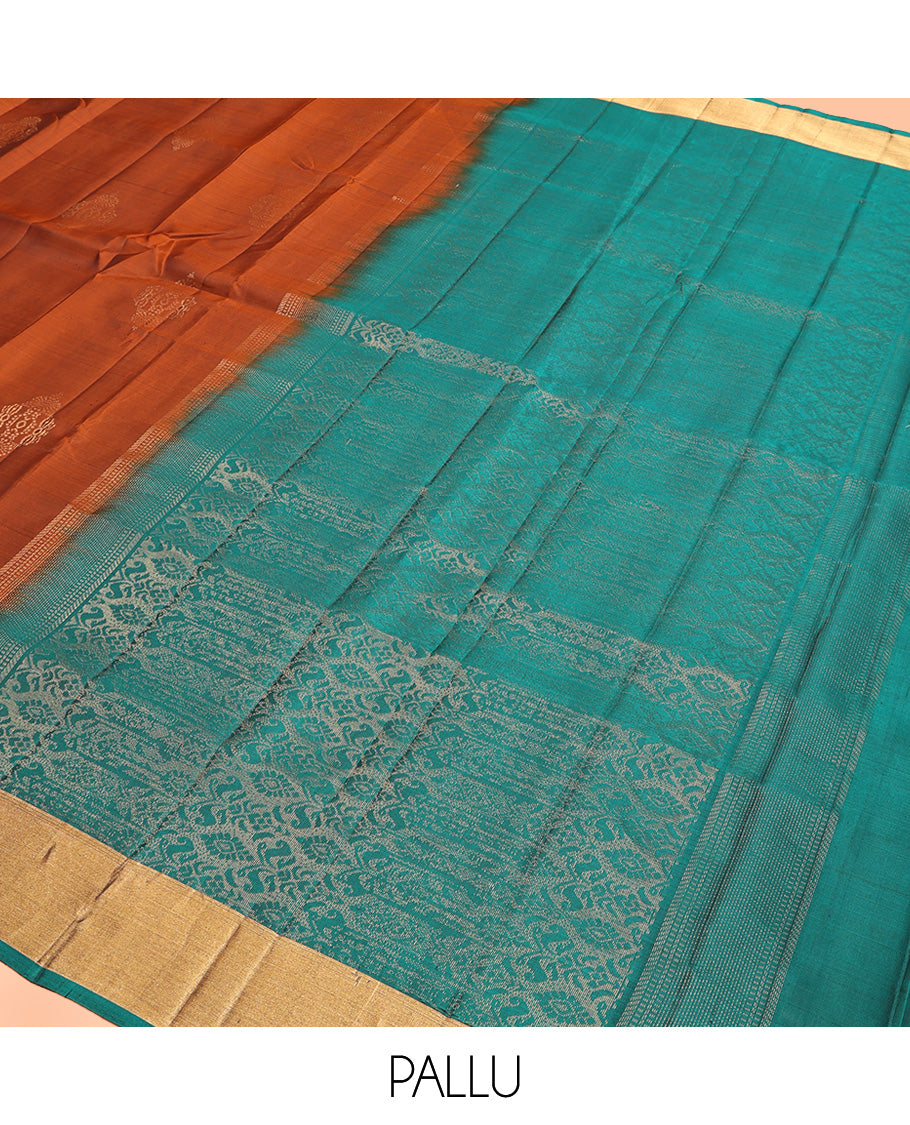 Rust Mayuri Lite Silk Mix Saree, Decorated with Zari Buttas All Over Its Body, Highlighted by Zari Bavanji Border, Complemented by Intricately Designed Pallu, and Paired with a Contrast Blouse