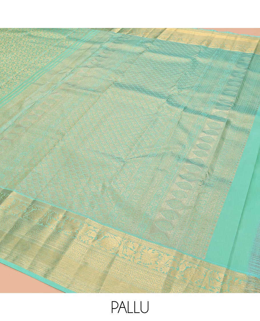 Turquoise Kanchipuram Wedding Silk Saree, Decorated with Jacquard Design, a Traditional Zari Border, Grand Pallu, and a Matching Blouse