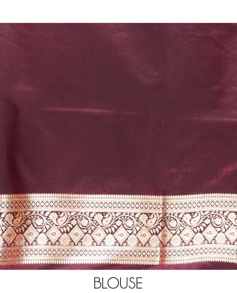Wine Semi-Banaras Saree, Artfully Detailed with Floral Jaal Jacquard All Over Its Body, Highlighted by a Traditional Motif Border, Intricately Designed Pallu, and Paired with a Matching Blouse