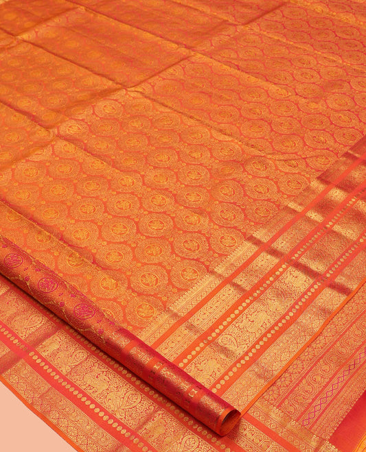Orange Kanchipuram Wedding Silk Saree, Richly Detailed with Jacquard Design, a Zari Border of Thilakam, Poun, Manga, Mayil, Yaali, Paisa, and Dhavana Kodi, Grand Pallu, and a Matching Blouse