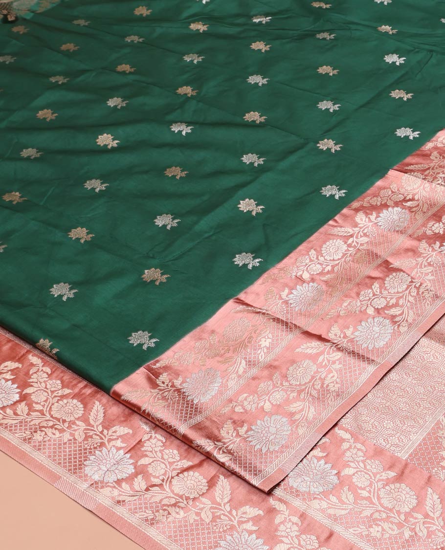 Bottle Green Mushuru Silk Saree, Enriched with Zari Buttas All Over Its Body, Complemented by Captivating Contrast Border of Floral Jaal Designs, Grandly Decked Up Pallu and Paired with a Contrast Blouse
