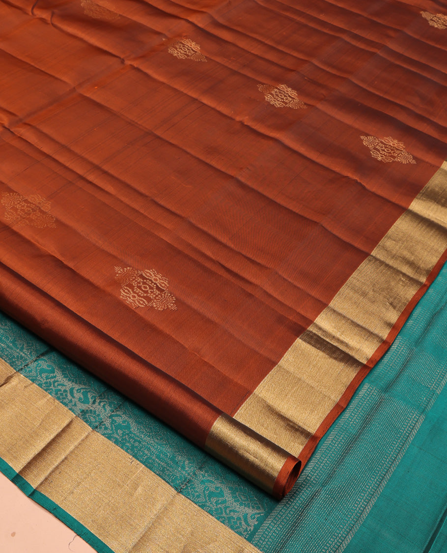 Rust Mayuri Lite Silk Mix Saree, Decorated with Zari Buttas All Over Its Body, Highlighted by Zari Bavanji Border, Complemented by Intricately Designed Pallu, and Paired with a Contrast Blouse