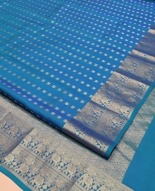 Blue Vasundhara Lite-Silk Mix Saree, Artfully Woven with Mayil Buttas, Highlighted by Zari Border of Rettai Neli, and Yaanai Designs, Grand Ogee Patterned Pallu, and Paired with a Matching Blouse