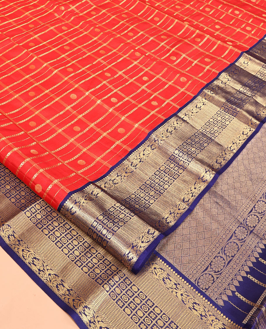 Orange Vasundhara Silk Saree, Enthralled with Zari Butta Enclosed Checks, a Contrast Traditional Zari Border, Grand Jaal Pallu, and a Contrast Blouse