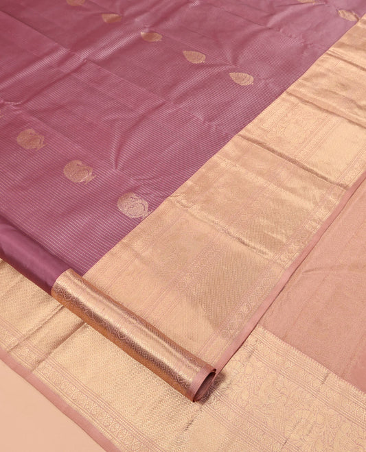 Rosewood Pink Vasundhara Silk Saree, Crafted with Zari Buttas and Stripes, a Contrast Border of Thilakam Mokku, Cross Kamalam, and Mayil Designs, Grand Pallu, and Contrast Blouse