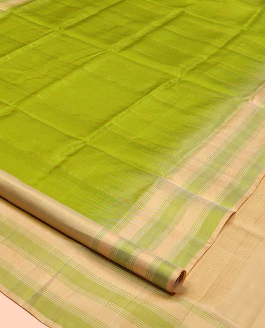 Green Mayuri Soft Silk Saree, Detailed with Zari Stripes, Complemented by a Contrast Border, Pallu of Zari Designs, and Contrast Blouse