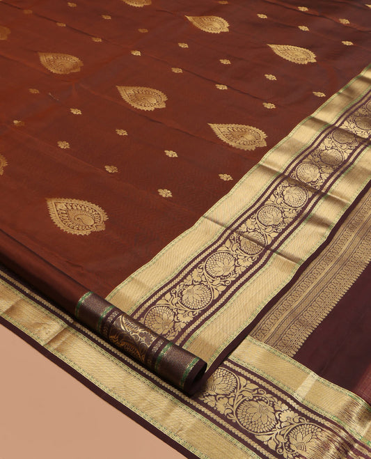 Brown Vasundhara Lite Silk Mix Saree, Crafted with Zari Buttas, a Zari Border of Kodi Visiry Designs, Vanki Pallu, and a Matching Blouse