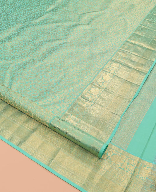Turquoise Kanchipuram Wedding Silk Saree, Decorated with Jacquard Design, a Traditional Zari Border, Grand Pallu, and a Matching Blouse