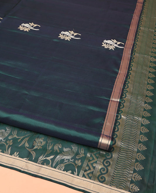Green Mayuri Soft Silk Saree, Bedecked with Bird Buttas All Over Its Body, Highlighted by Zari Piping Border, Pallu of Floral Jaal and Bird Designs, and Paired with a Matching Blouse