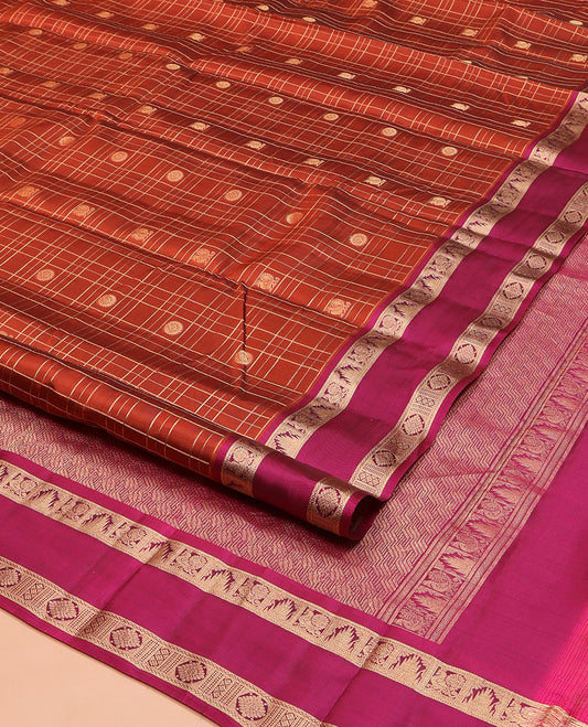 Orange Vasundhara Lite Silk Mix Saree, Enriched with Mayil-Chakram Butta Enclosed Checks, Complemented by Contrast Rettai Pettu Border of Mayil, Thazampoo Rekku, and Laddu Kamalam Designs, Geometric Patterned Pallu, and Paired with a Contrast Blouse