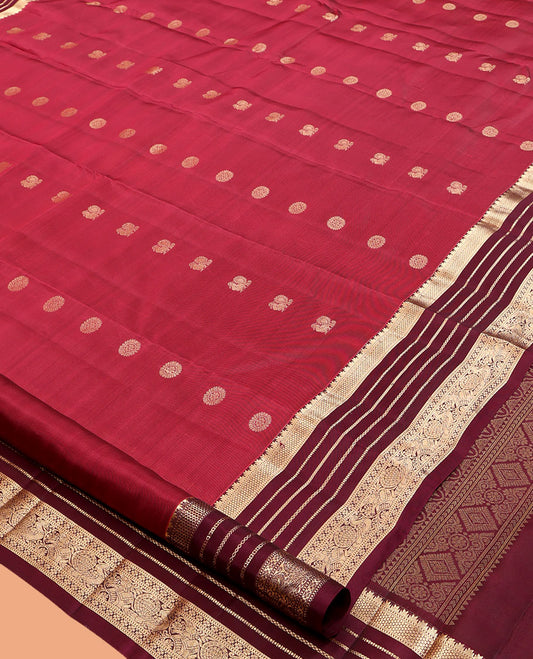 Red Vasundhara Lite Silk Mix Saree, Prettified with Mayil-Chakram Buttas, a Contrast Border of Rekku, Muthu, and Mayil Designs, Grand Pallu, and a Contrast Blouse