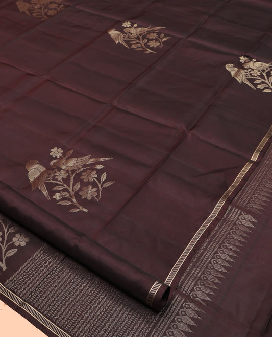 Brown Mayuri Lite Silk Mix Saree, Ornamented With Floral-Macaw Buttas, a Subtle Piping Border, Geometric Pallu and a Matching Blouse