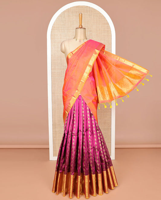 Dark pink floral design silk half saree with contrast border of thilakam mokku, banaras, paun design, zari design blouse & zari design border dhavani