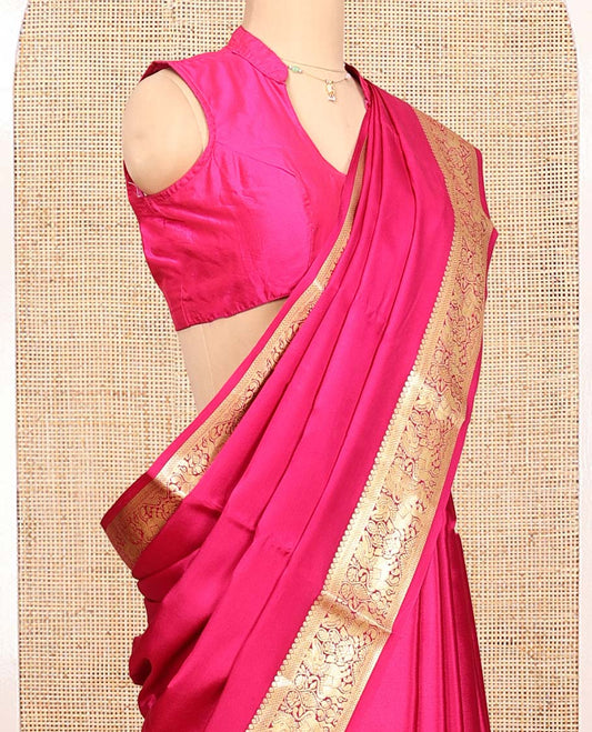Pink Plain Mysore Silk Saree, Highlighted by a Traditional Zari Border of Yaali Designs, Pallu Steeped with Traditional Designs, and Paired with a Matching Blouse