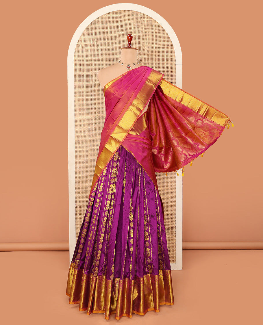 Purple Pure Silk Half-Saree Artfully Detailed with Zari Designs on its Skirt, Complemented by a Contrast Border Featuring Neli, Manga, Rekku, Rudraksham, And Mayil Kann, Comes with a Contrast Blouse and a Dhavani of Anna Chakram Designs
