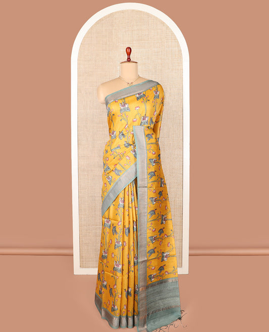 Yellow Pichwai cow and lotus motifs printed tussar silk saree, contrast traditional zari border, and striped pallu