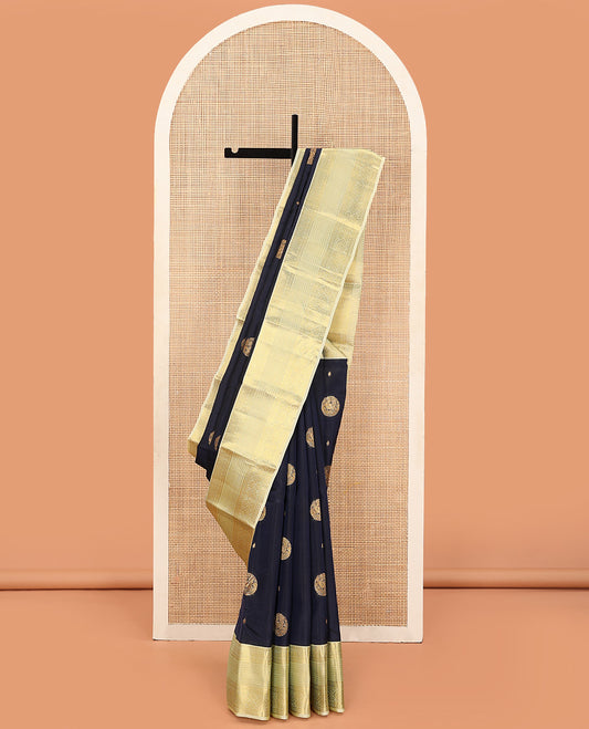 Blue Vasundhara Lite Silk Mix Saree Spotlighted with Round Mayil Buttas, Featuring a Contrast Border of Thilakam Mokku, Paisa, Neli, Banaras, Muthu, and Laddu Kamalam Designs, Zari-Rich Jaal Pallu, and a Contrast Blouse