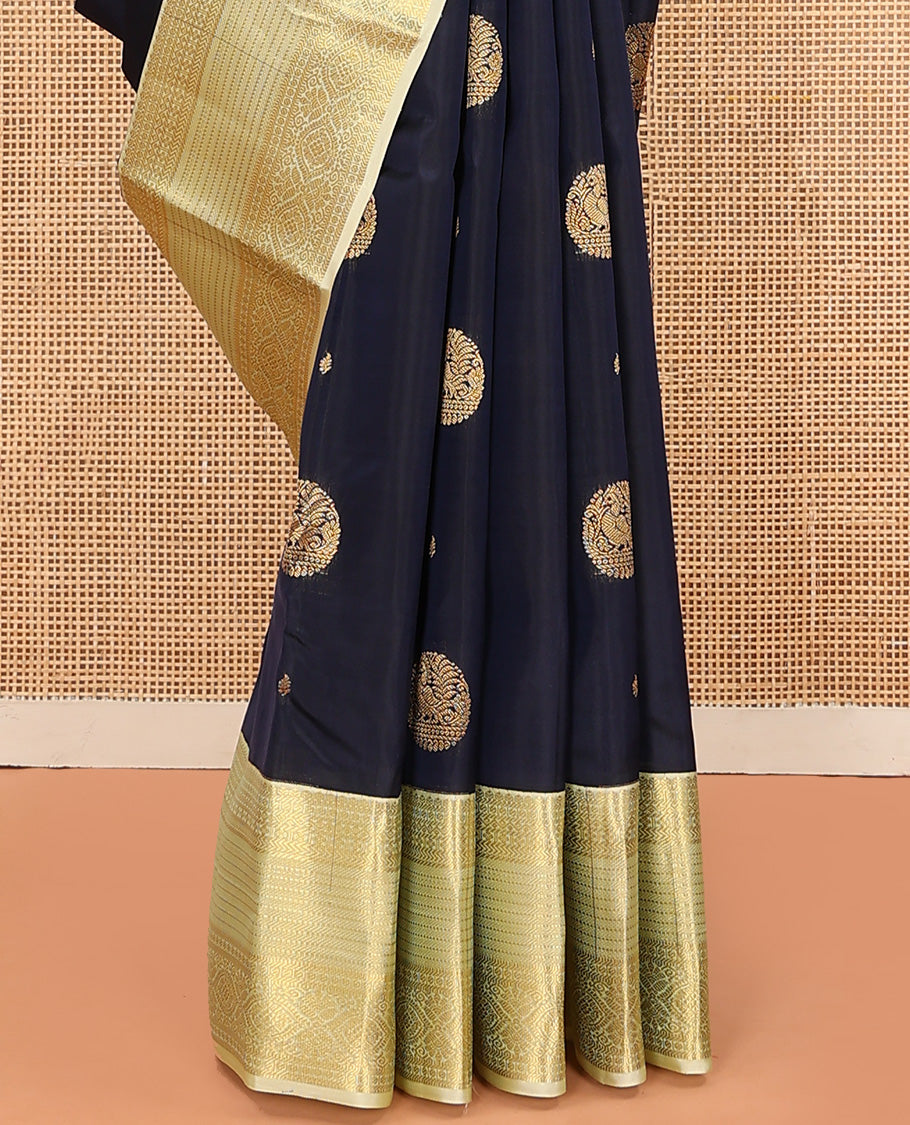 Blue Vasundhara Lite Silk Mix Saree Spotlighted with Round Mayil Buttas, Featuring a Contrast Border of Thilakam Mokku, Paisa, Neli, Banaras, Muthu, and Laddu Kamalam Designs, Zari-Rich Jaal Pallu, and a Contrast Blouse
