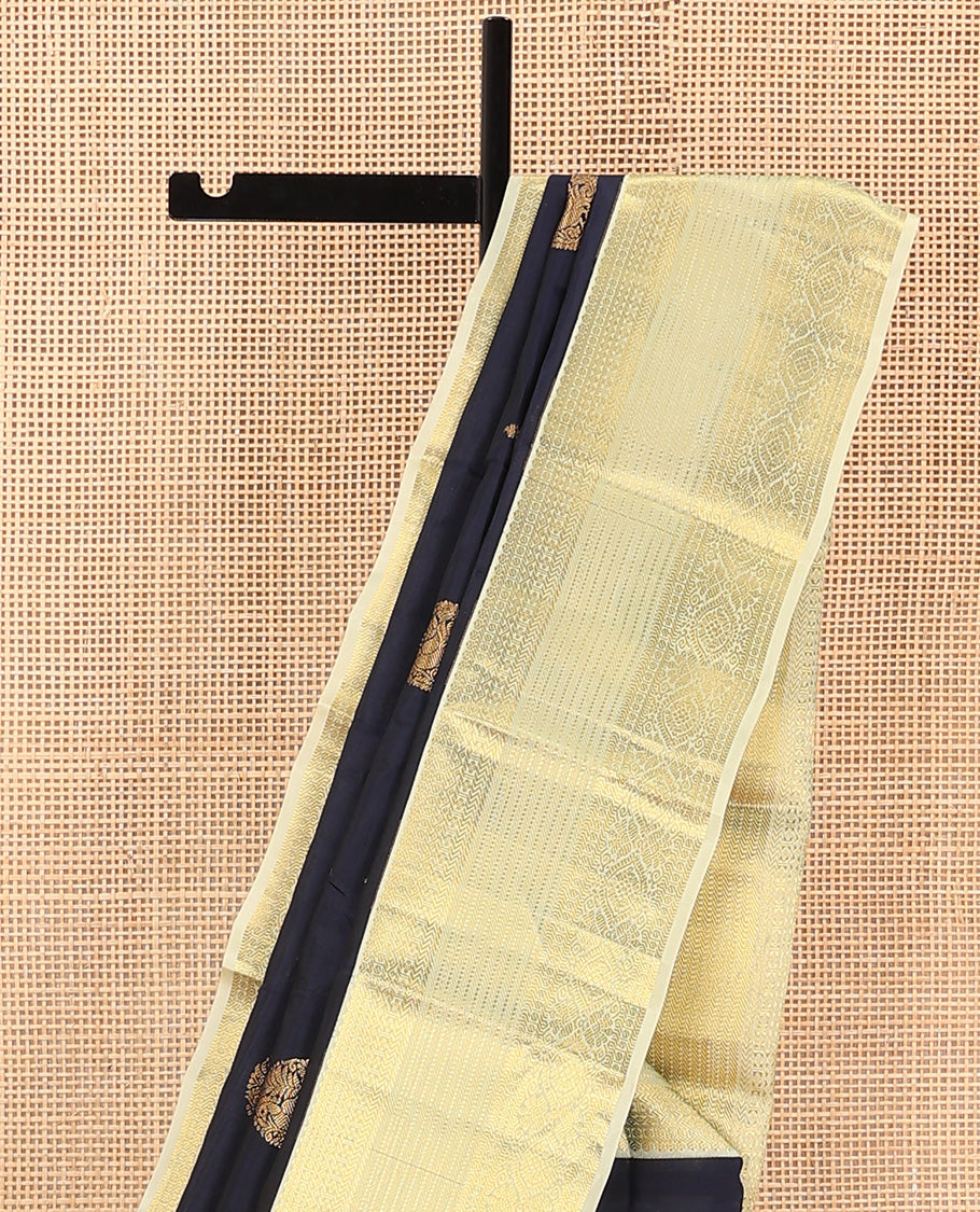 Blue Vasundhara Lite Silk Mix Saree Spotlighted with Round Mayil Buttas, Featuring a Contrast Border of Thilakam Mokku, Paisa, Neli, Banaras, Muthu, and Laddu Kamalam Designs, Zari-Rich Jaal Pallu, and a Contrast Blouse