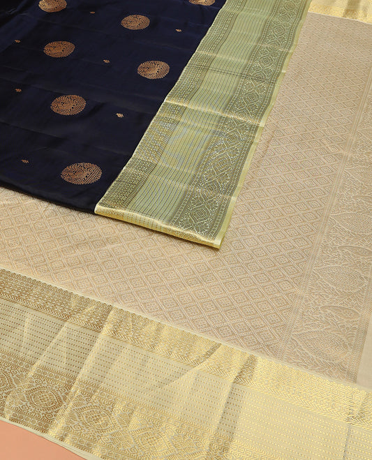 Blue Vasundhara Lite Silk Mix Saree Spotlighted with Round Mayil Buttas, Featuring a Contrast Border of Thilakam Mokku, Paisa, Neli, Banaras, Muthu, and Laddu Kamalam Designs, Zari-Rich Jaal Pallu, and a Contrast Blouse