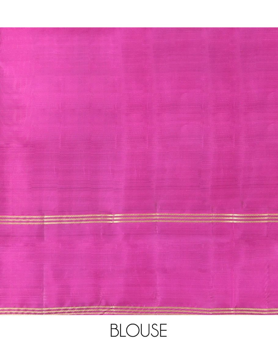 Green Vasundhara Lite-Silk Mix Saree, Beautifully Decorated with Zari Buttas All Over Its Body, Complemented by Contrast Rettai Pettu Border of Zari Stripes, Pallu Accentuated with Jaal Designs, and Paired with a Contrast Blouse