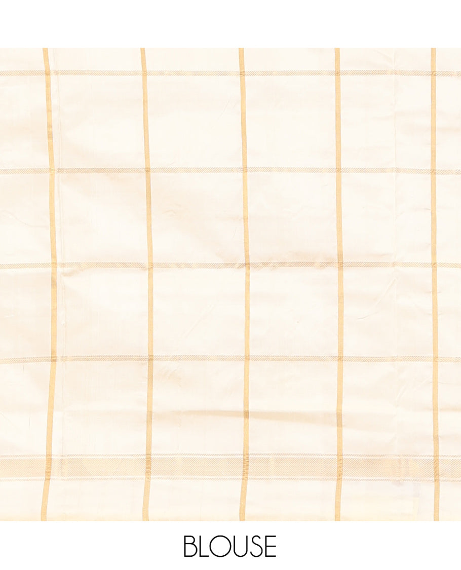 Black Ikkat Silk Saree, Impeccably Styled with Patola-Style Parrot-Elephant Butta Enclosed Checks on Its Body, Complemented by a Contrast Patola-Style Parrot-Elephant Butta Enclosed Border, Pallu of the Same Motifs, and Paired with a Contrast Blouse